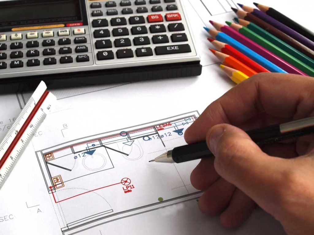 Engineer Working In A Building Facilities Blueprint